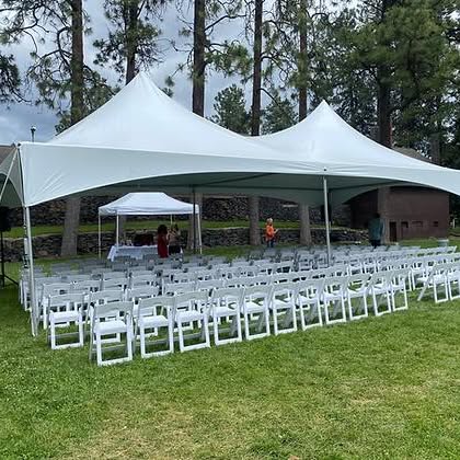 Tent setup with bar and lounge area
